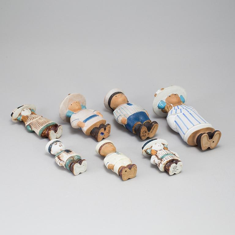 A set of seven "Sekelskifte" stoneware figurines by Lisa Larson for Gustavsberg.