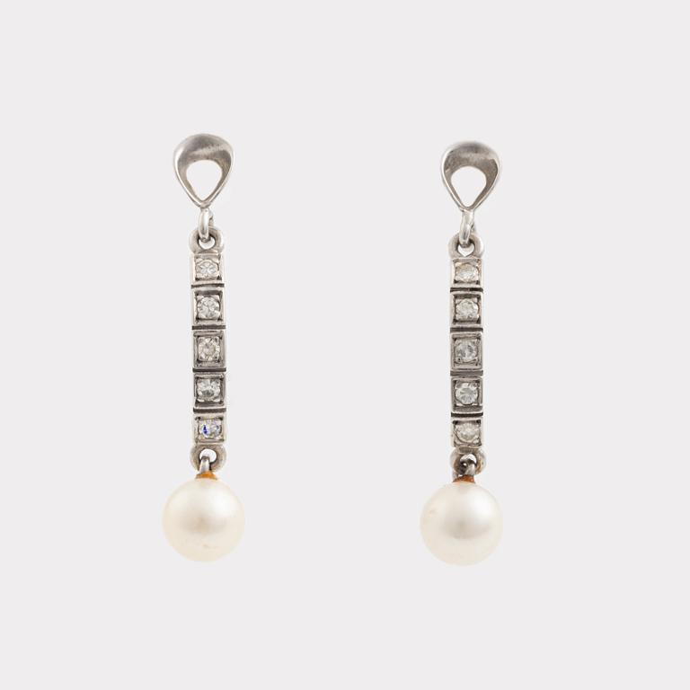 Necklace and earrings, a pair, cultured pearls, white gold, and brilliant- and octagon-cut diamonds.