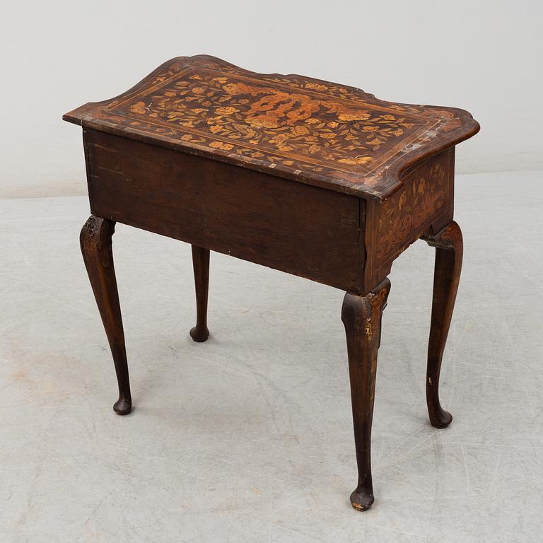 A Dutch 18th century Rococo chest of drawers.