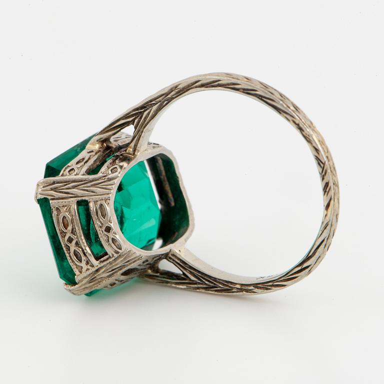 Synthetic emerald cocktail ring.