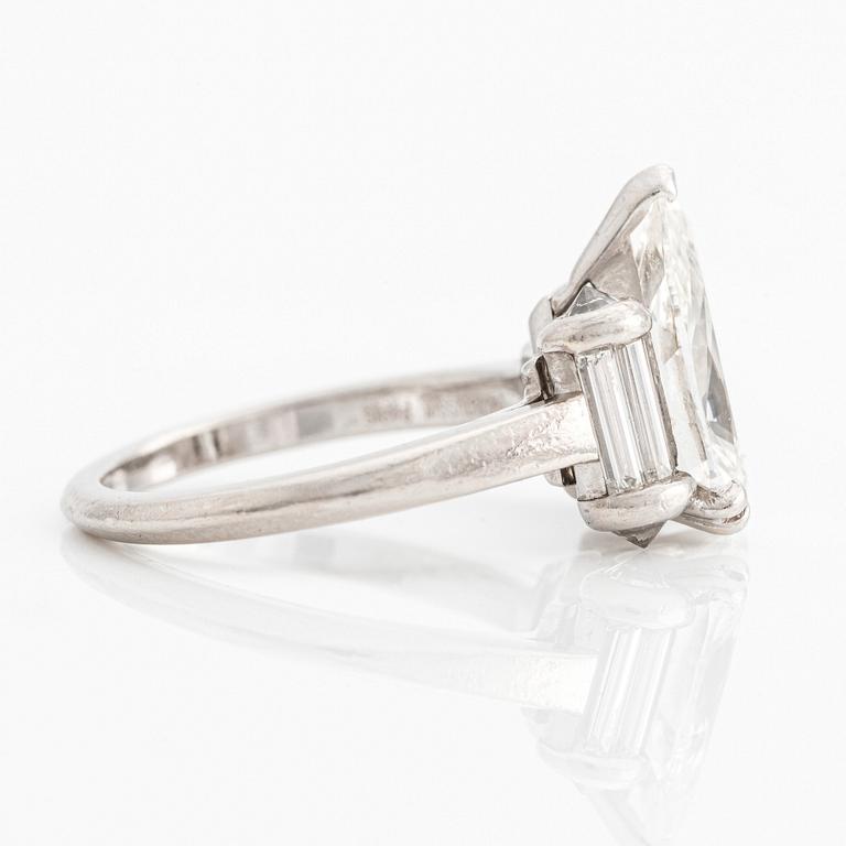 A Mauboussin platinum ring set with a pear-shaped diamond approximately 2.50 cts.