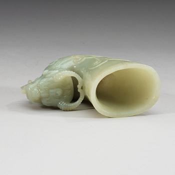 A Chinese carved nephrite rhyton beaker.