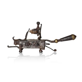 158. A mechanical flintlock igniter, later part 18th century/early19th century.