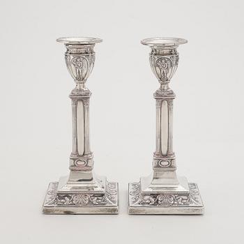 A pair of Edwardian silver candlesticks, London 1904, probably the mark of Thomas Bradbury & Sons (Turner Bradbury).