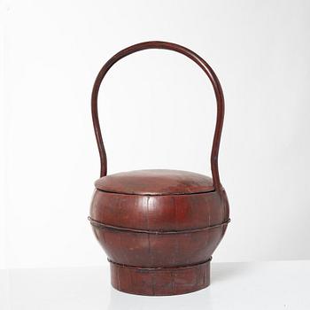 A group of three red wooden vessels, China/Southeast Asia, 20th century.