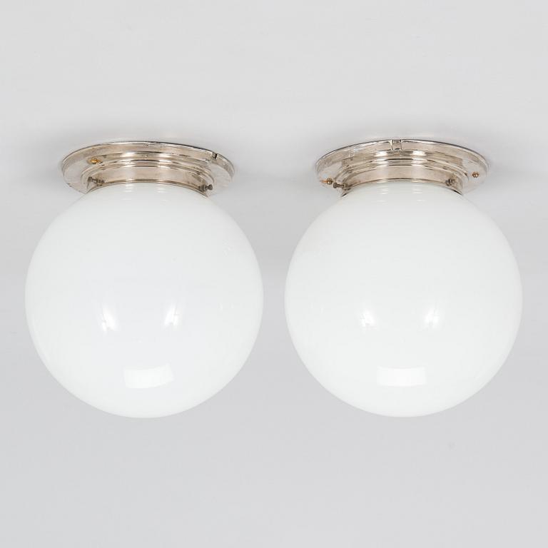 A pair of 1930s ceiling lights.