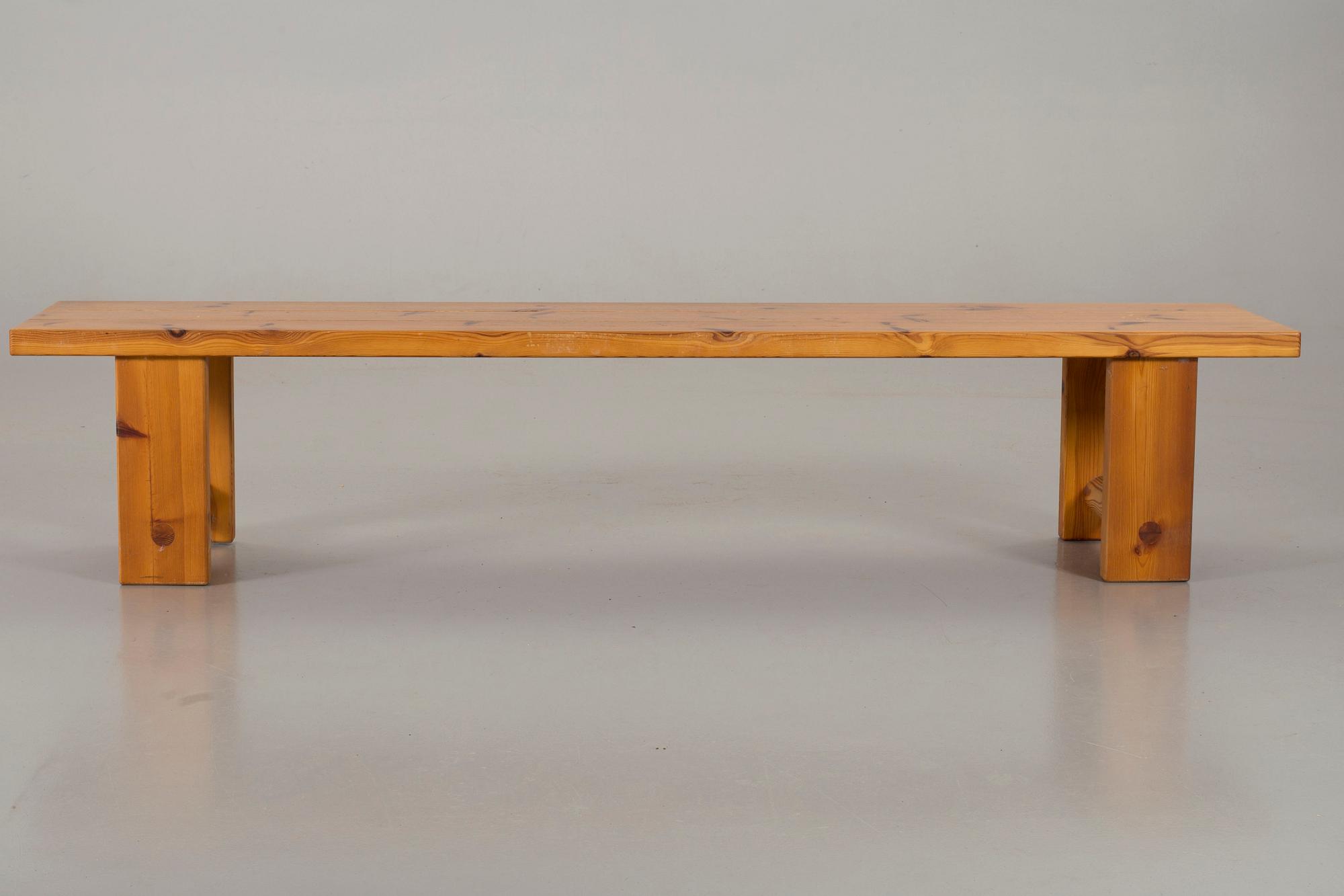 A PINE WOOD BENCH.