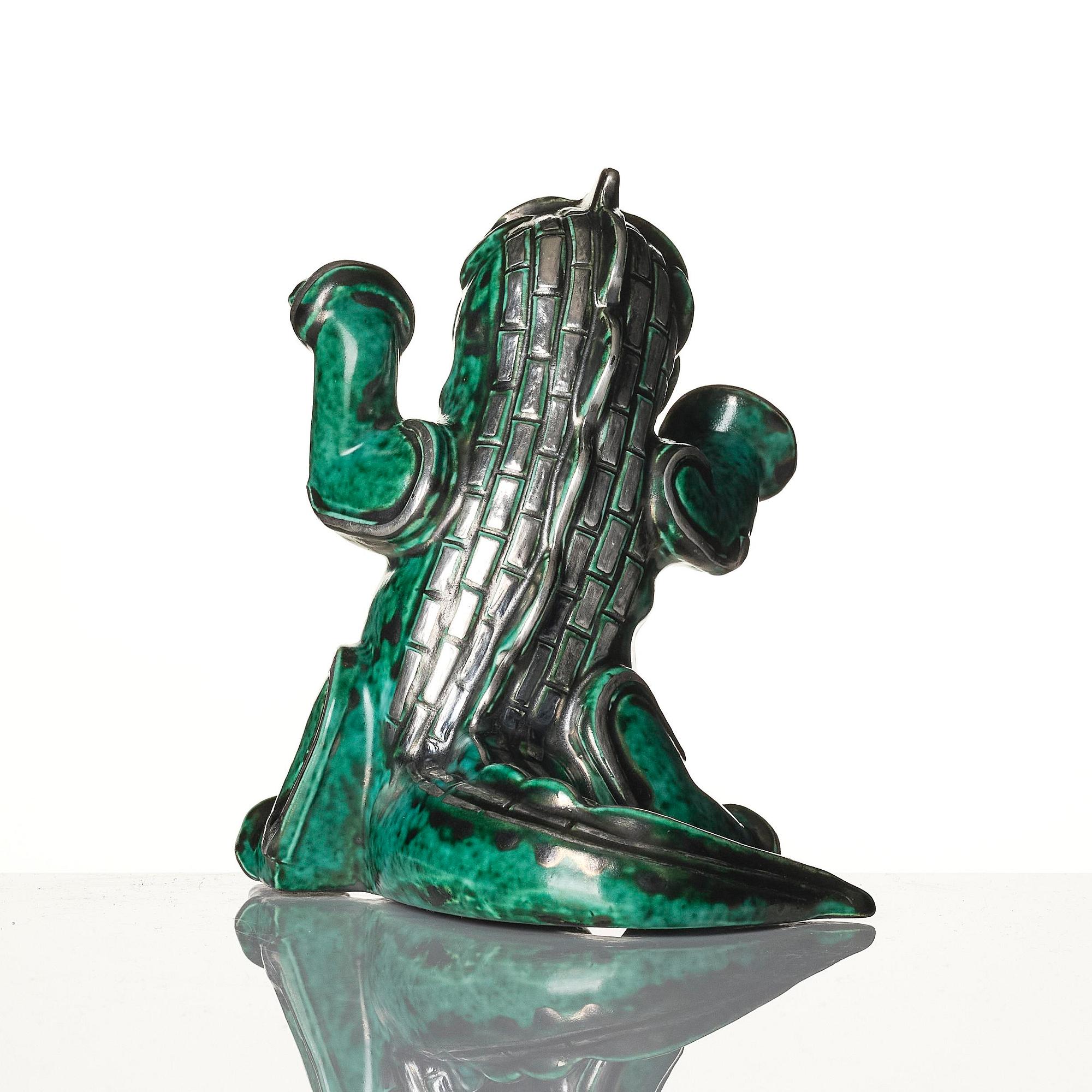 Wilhelm Kåge, an "Argenta" stoneware sculpture of a dragon puppy, Gustavsberg, 1940s.