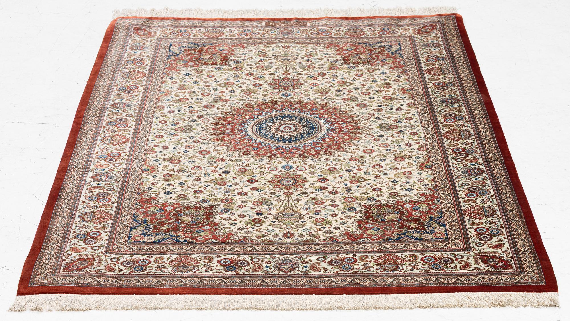 A silk Qum, Central Persia, signed Jashmedi c. 141 x 103 cm.
