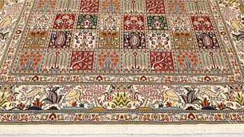 A part silk Moud rug, approx. 250 x 199 cm.