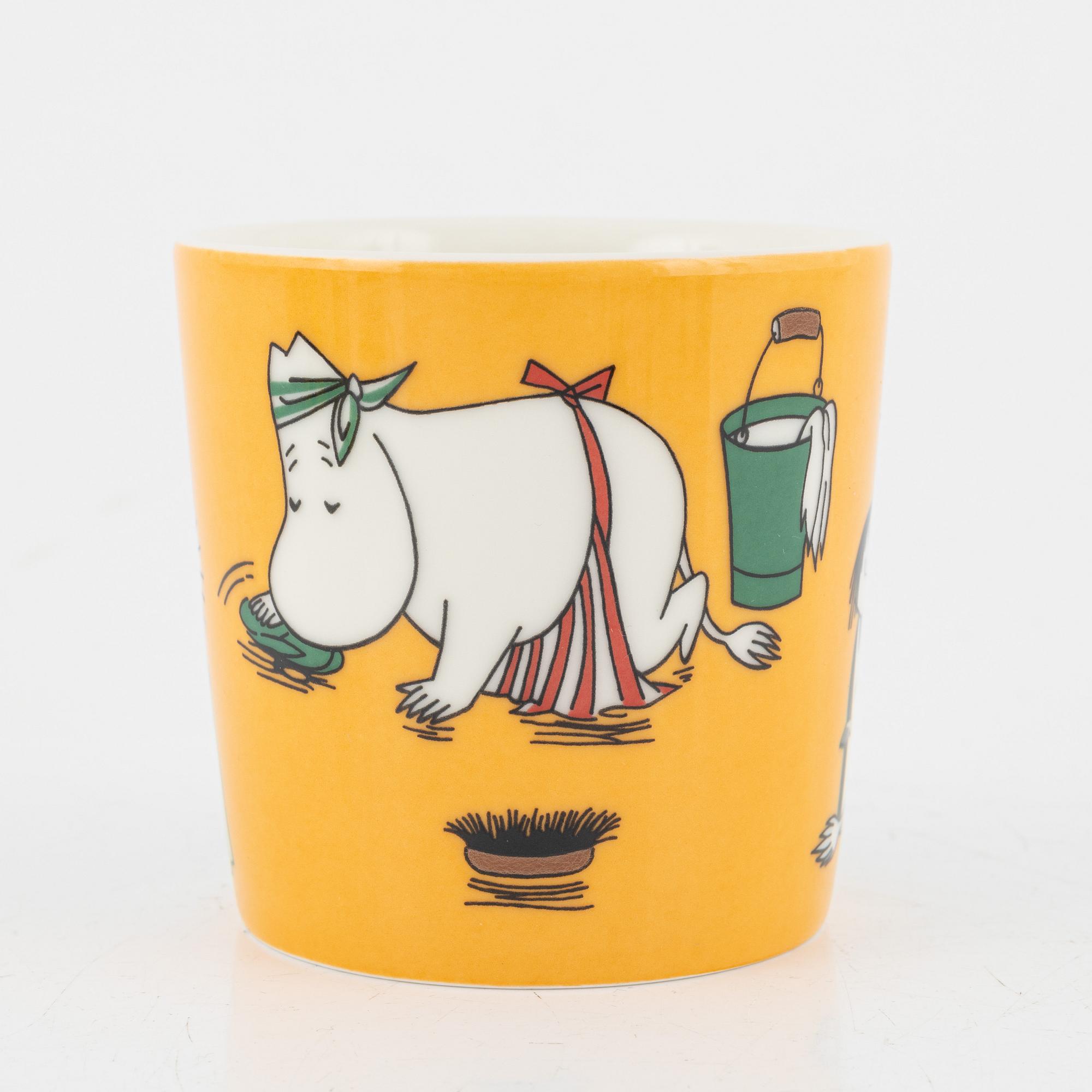 Eleven porcelain Moomin mugs, Arabia, Finland.