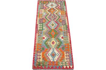 A runner carpet, Kilim. c. 289 x 81 cm.