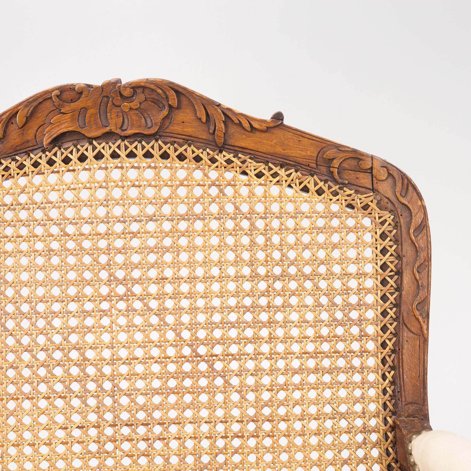 A French Louis XV armchair, mid 18th century.