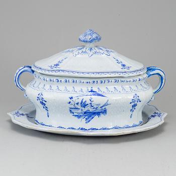 A Swedish Rörstrand faience tureen with cover and stand, 18th Century.