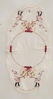 A collection of smaller Christmas tablecloths, runners, and wall hangings, approximately 34 pieces, mid/second half of the 20th century.