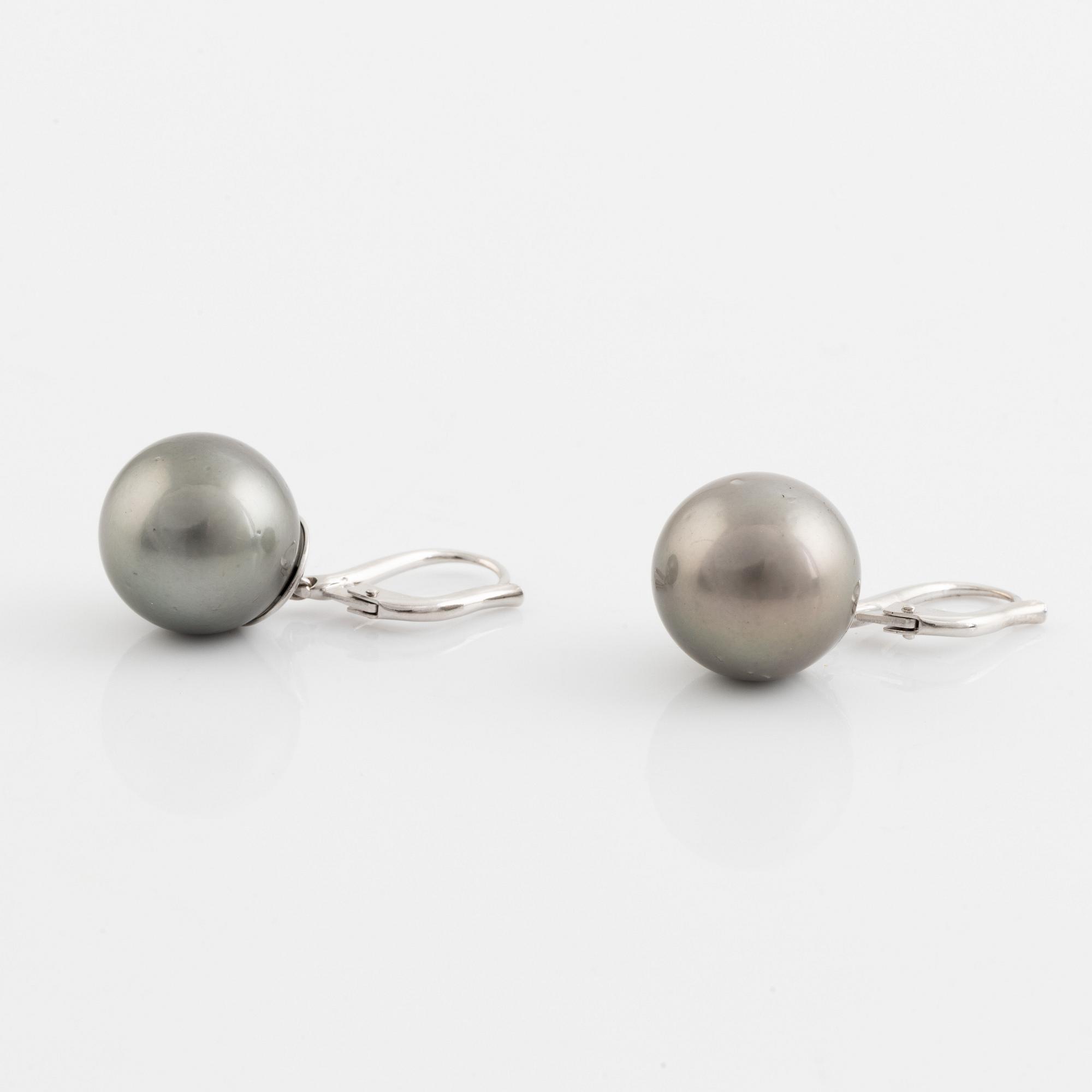 Cultured Tahiti pearl earrings.