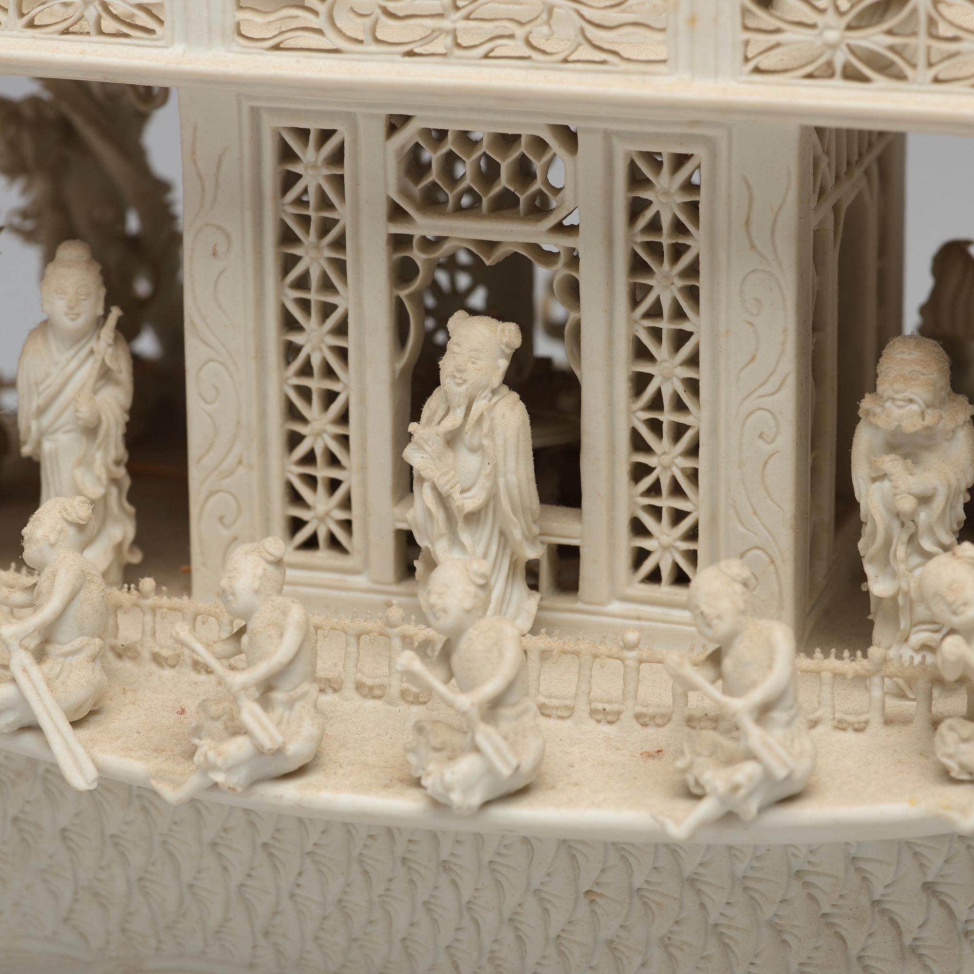 A biscuit porcelain dragon boat of 'Assembly of Immortals', Qing dynasty, Daoguang, signed Chen Guozhi, 19th century.