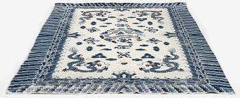 An antique Chinese ' five dragon rug', c. 280 x 190 cm.