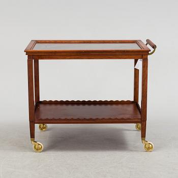 AN EARLY 19TH CENTURY SERVING TROLLEY.