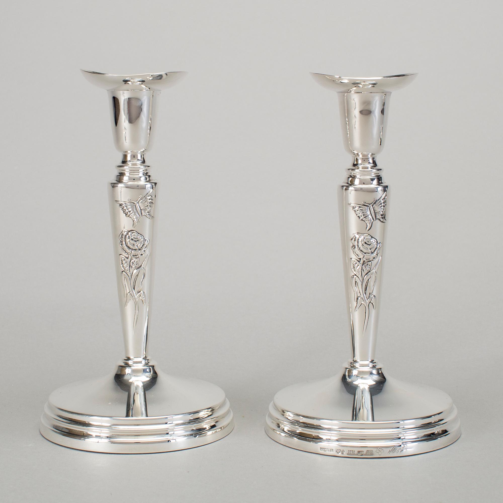 A pair of silver candlesticks by Meya Lerible for Mema, Linköping 1994.
