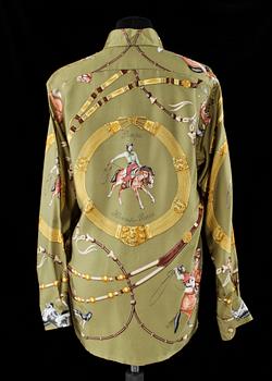 A silk blouse by Hermès.