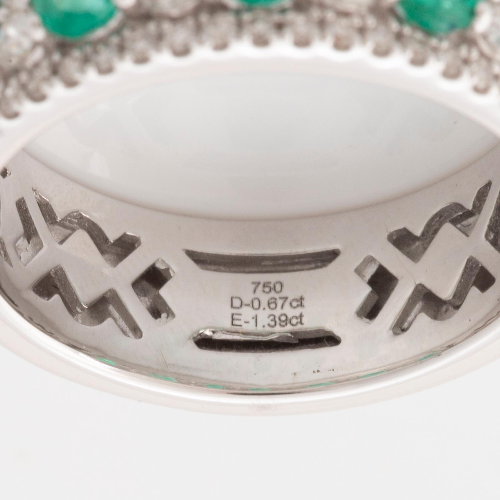 Emerald and brilliant cut diamond ring.
