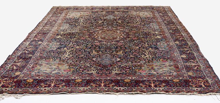 A carpet, Antique/semi-antique Kerman, ca 340 x 220 cm.
