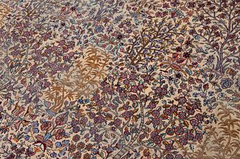 An antique 'Millefleur' Kerman Laver carpet, c. 964 x 426 cm.