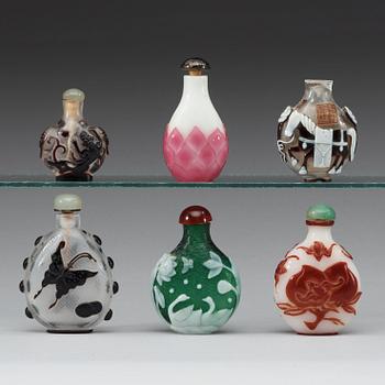 A set of six Chinese Peking glass snuff bottles.