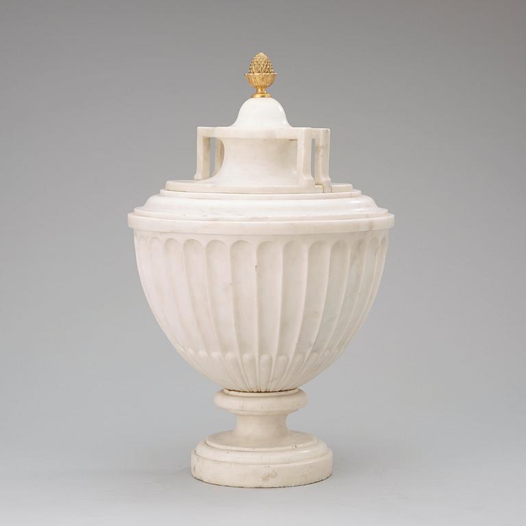 A late Gustavian circa 1800 white marble urn with cover.