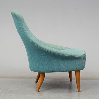 KERSTIN HÖRLIN-HOLMQVIST, a 'Lilla Eva' easy chair, for Nordiska Kompaniet, mid 20th century.