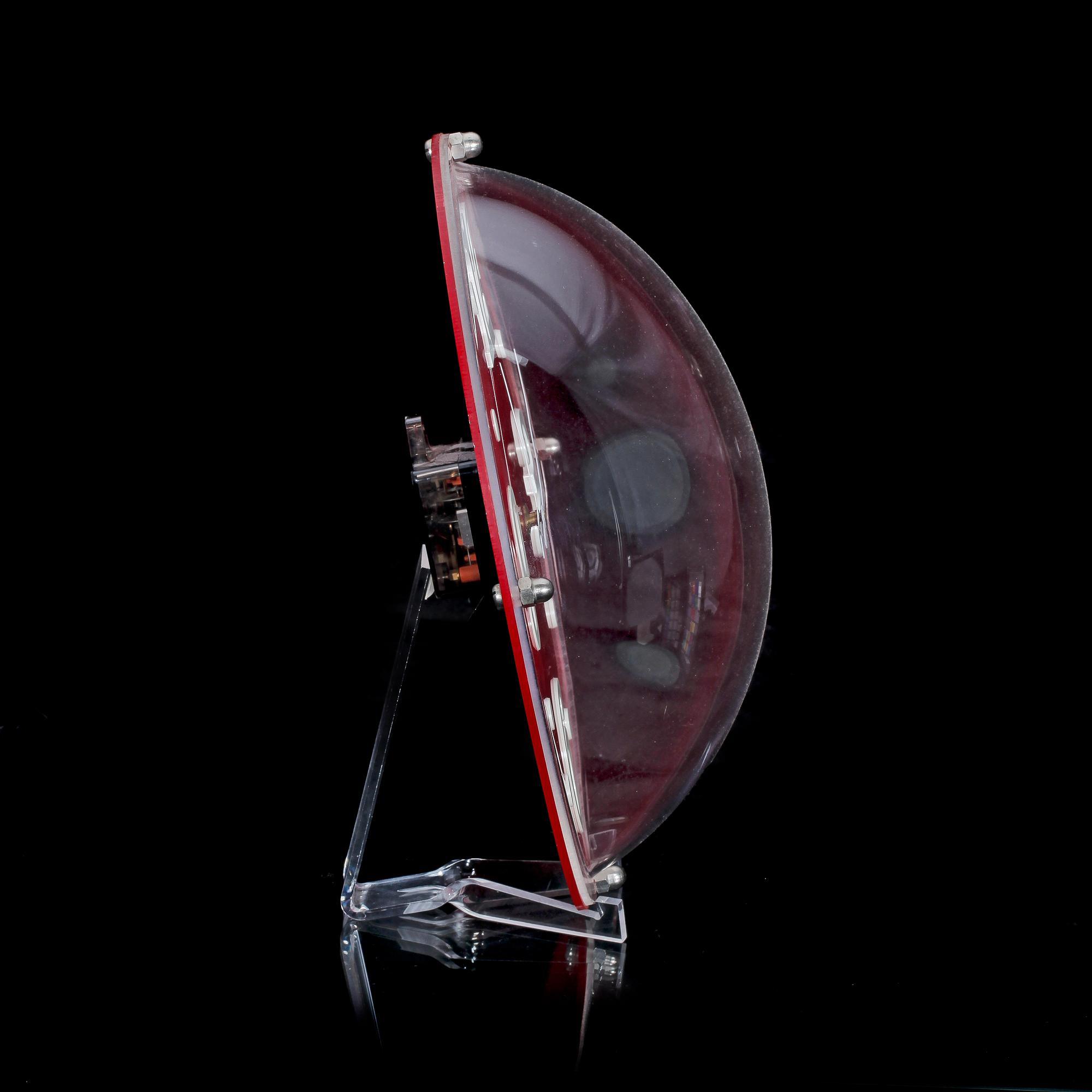 VÄGGUR, plexiglas, "Saturnus" design Ulf Velander.