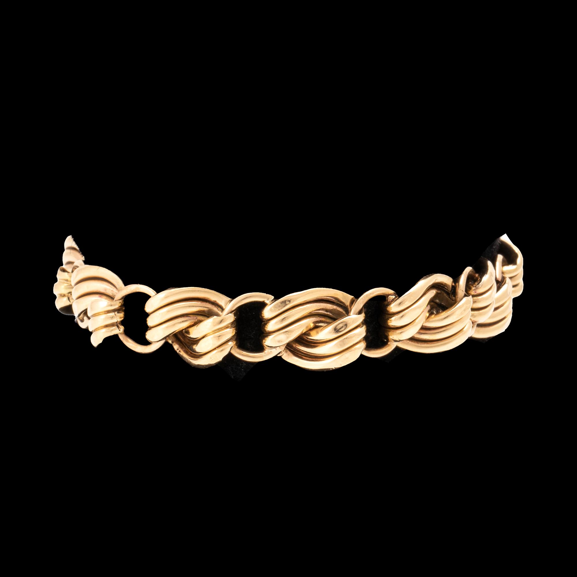 An 18K gold bracelet.