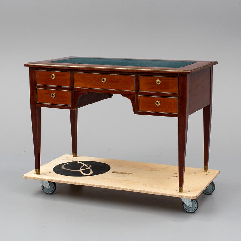 A mahogany veneered Gustavian style desk, circa 1900.