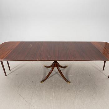 A mid 1900s English style mahogany dining table.
