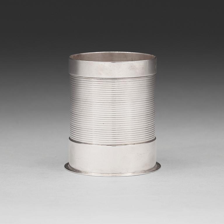 Sigvard Bernadotte, A Sigvard Bernadotte sterling bottle holder (for beer bottle), Georg Jensen, Copenhagen 1925-32.