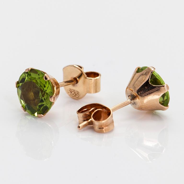 Earrings, 14K gold with peridots.