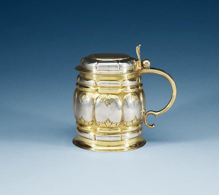 A German 17th century parcel-gilt tankard, makers mark of Paul Solanier, Augsburg 1689.