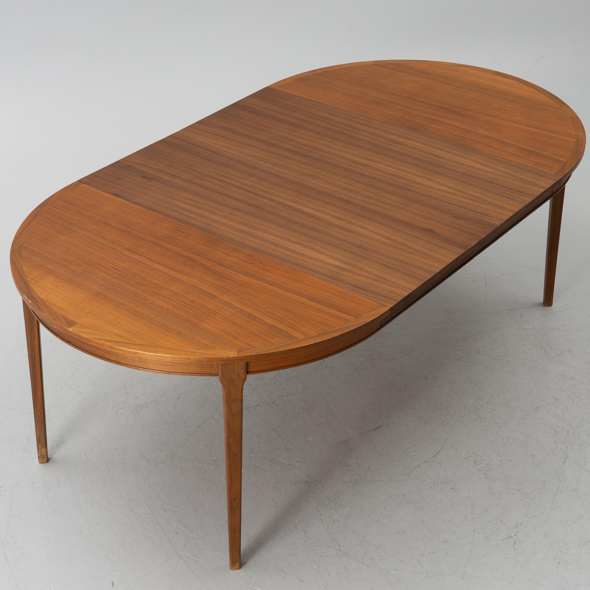 Linde Nilsson, dining table with eight chairs, Lammhult, second half of the 20th century.