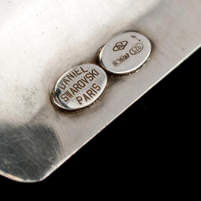 ARMLÄNK, 18k guld och sterlingsilver samt fasettslipad grön sten, Daniel Swarovski, Paris, 1900-tal. Vikt 89 g.