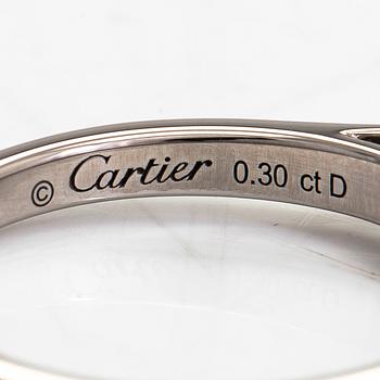 Cartier, ring, solitär, platina med en diamant ca 0.30 ct enligt gravyr.
