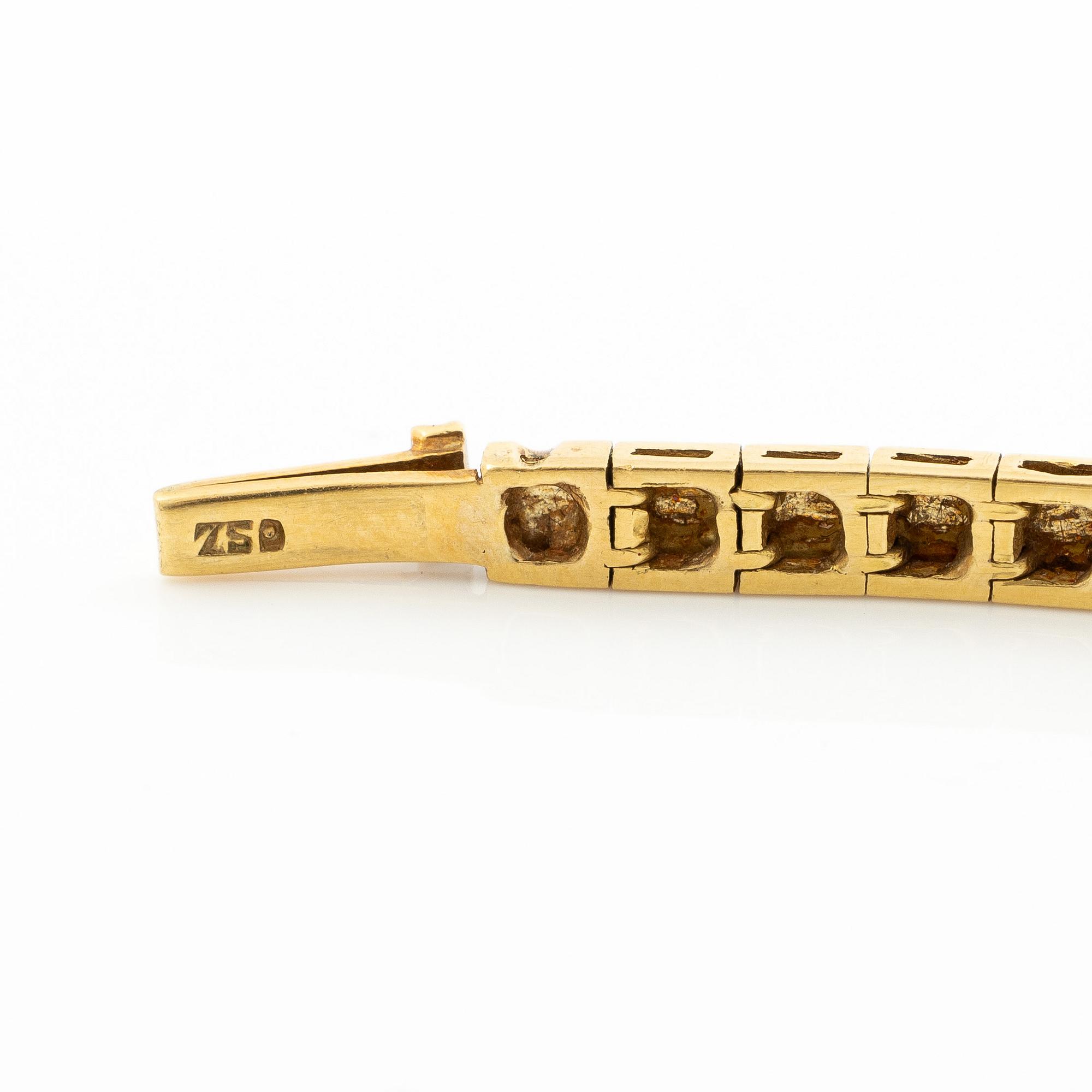 Bracelet, 18K gold with brilliant-cut diamonds, carré-cut rubies, emeralds and sapphires.