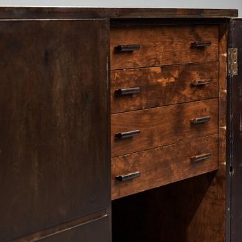 Axel Einar Hjorth, a darkly stained birch sideboard,"Typenko", Nordiska Kompaniet, Sweden 1932.