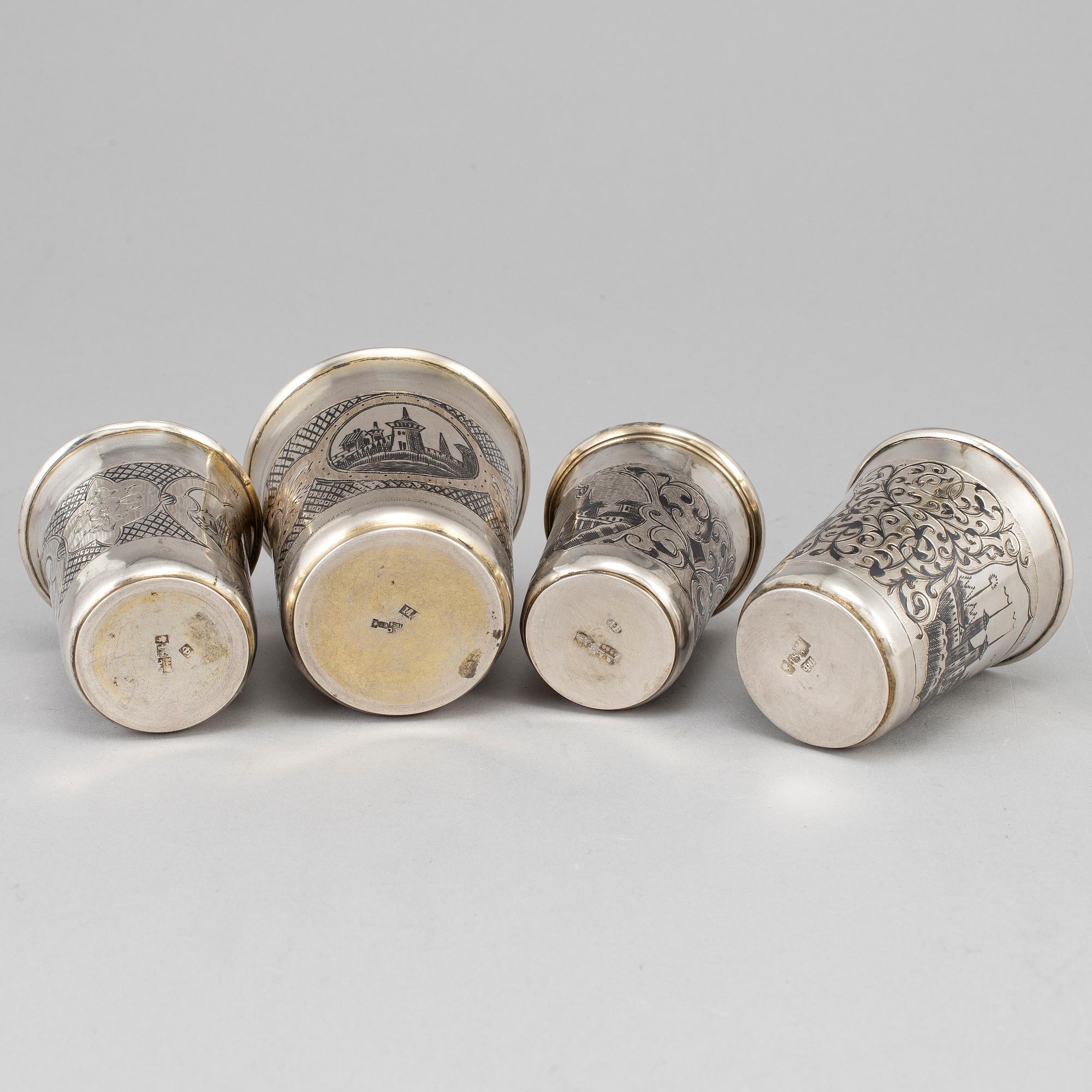 A set of four Russian 19th century silver and niello vodka cups, Moscow.