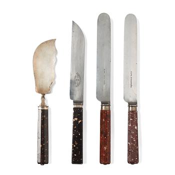 112. FOUR PIECES OF CUTLERY, porphyry handles, 19th century.