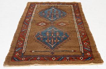 An antique Sarab rug, northwestern Iran, c. 213 x 107 cm.