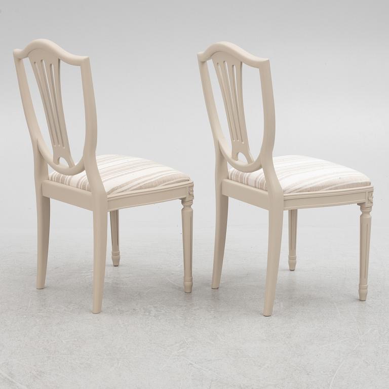 A Gustavian Style Dining Table and 10 Chairs, second half of the 20th Century.