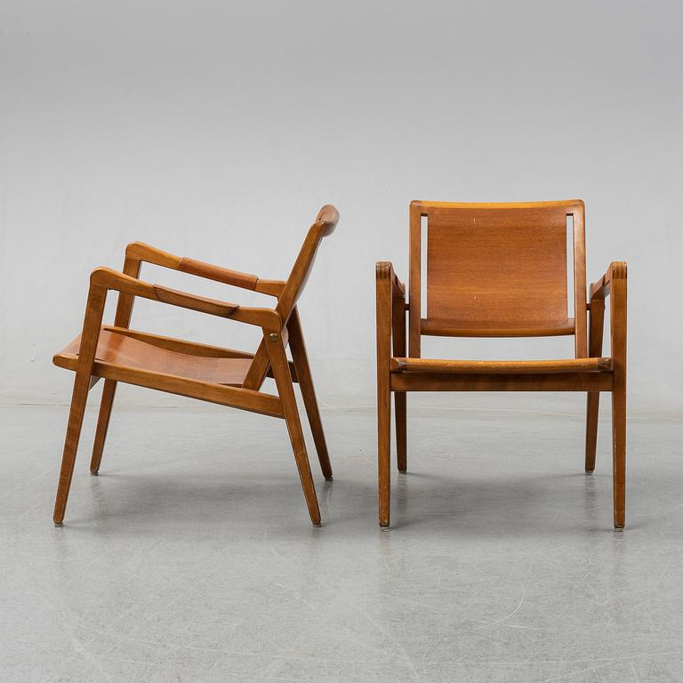 Axel Larsson, A pair of Swedish Bodafors armchairs, mid 20th century.