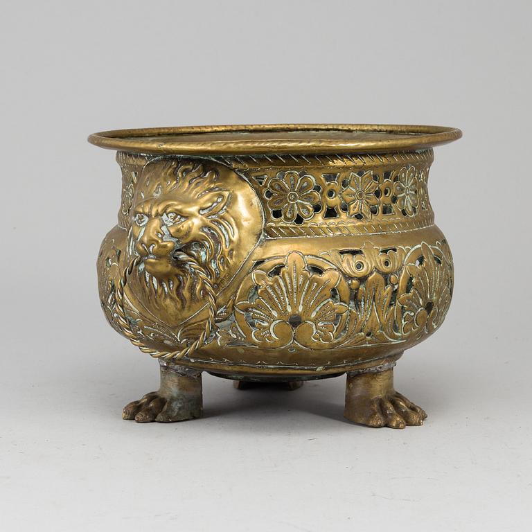 An 18th century brass flower pot.