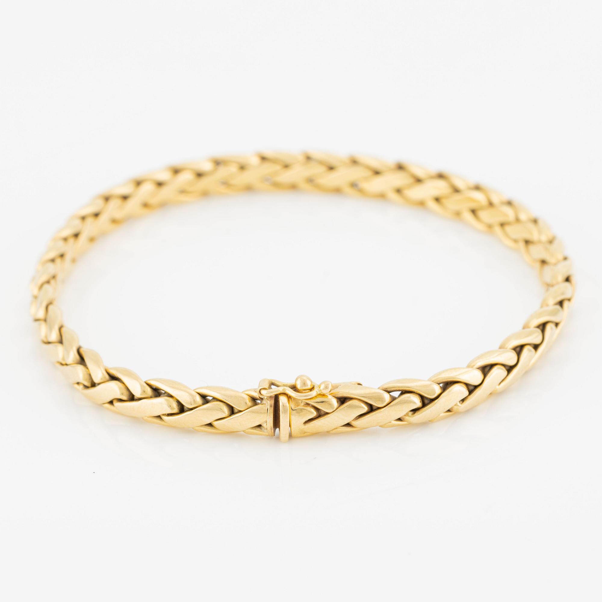 Collier/armband med en rund briljantslipad diamant ca 0.35 ct.